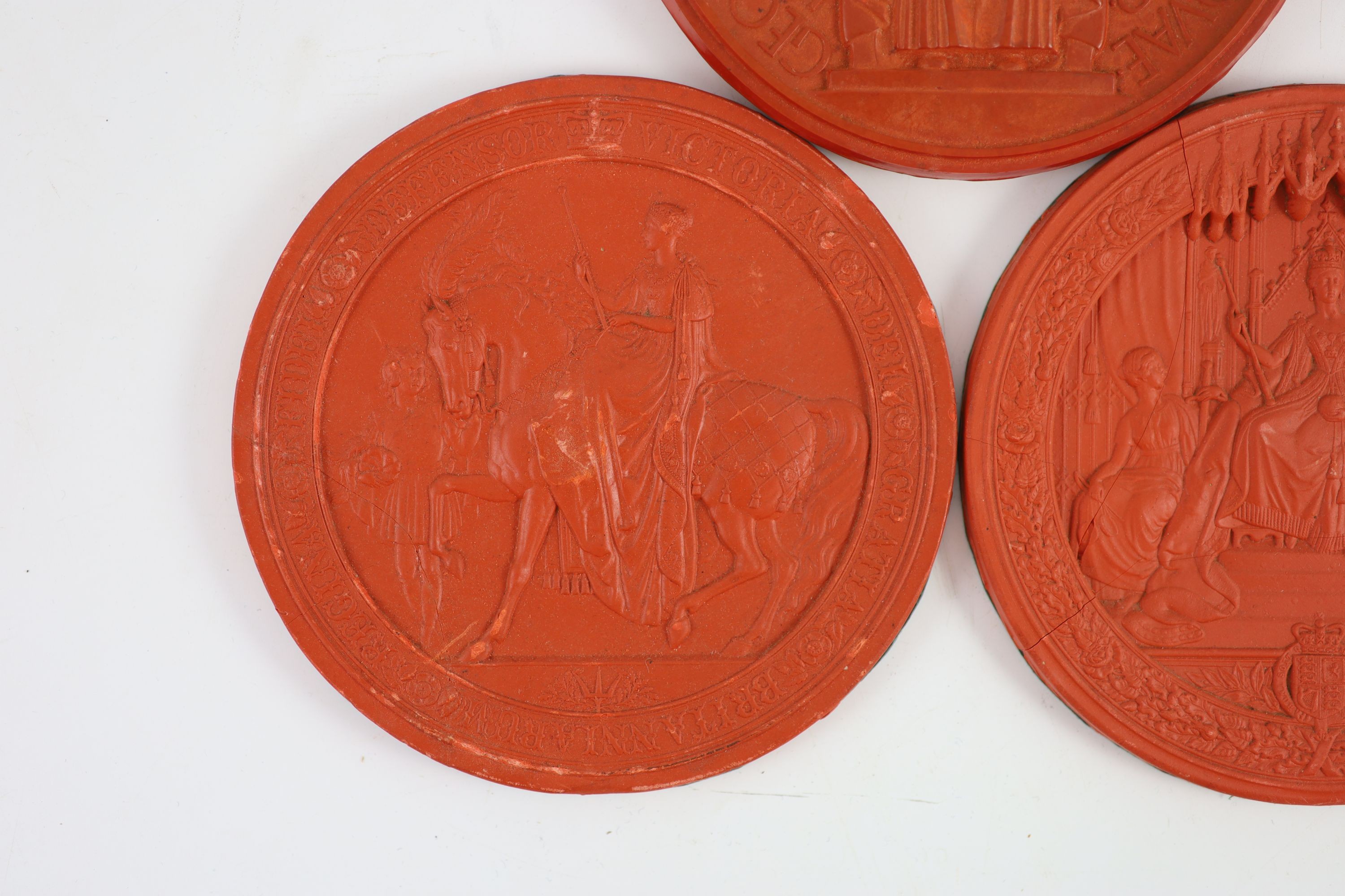 Three red wax Great Seals, two Queen Victorian Great Seals of the Realm, and a George V seal, 16.5 and 16 cm diameter